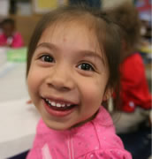 Closeup photo of smiling young girl