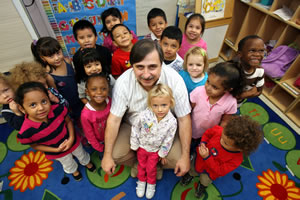 Jeff Benatti with a group of children.