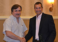 Louis Hering being congratulated by Jeff Benatti on receiving the 2011 Ethel M. Cooper Outstanding Service Award. 